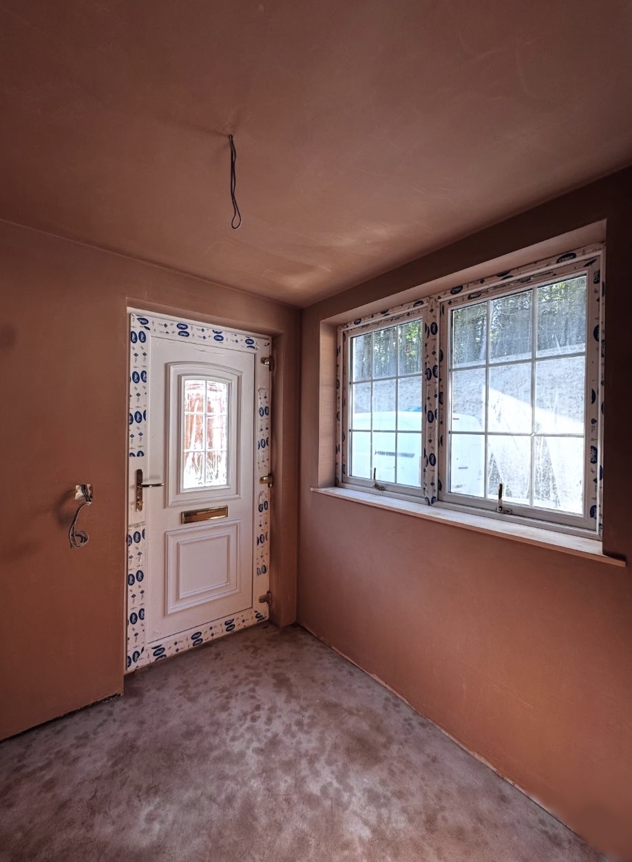 Hallway entrance — fresh plaster